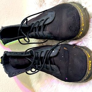 Dr Martens black boots.